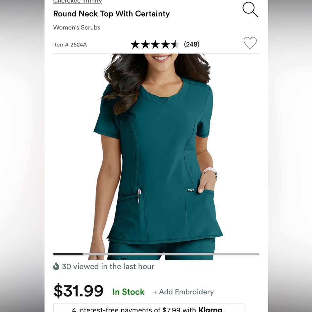 Cherokee Infinity scrubs-one set of navy blue and one set of Caribbean blue.